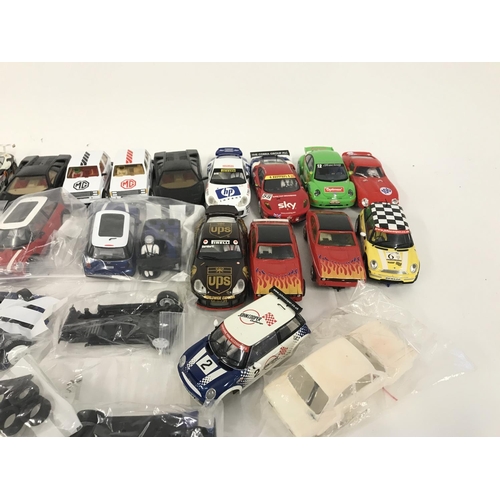 720 - A box containing approximately 20 Scalextric cars. Plus various spares and accessories. No reserve.