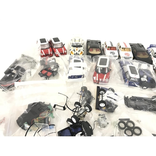 720 - A box containing approximately 20 Scalextric cars. Plus various spares and accessories. No reserve.