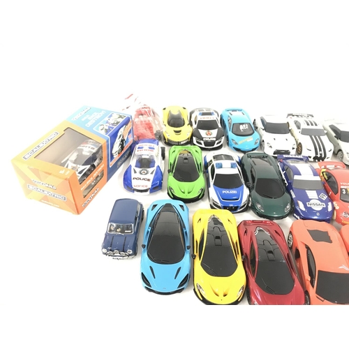 727 - A box containing a quantity of used Scalextric cars. Also to include a quantity of spare parts. Many... 