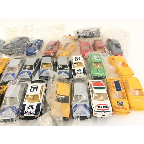 729 - A bag containing a collection of Scalextric cars. Also included some spare parts. No reserve.