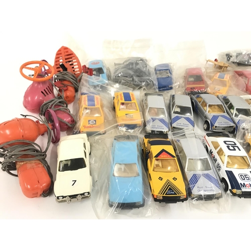 729 - A bag containing a collection of Scalextric cars. Also included some spare parts. No reserve.