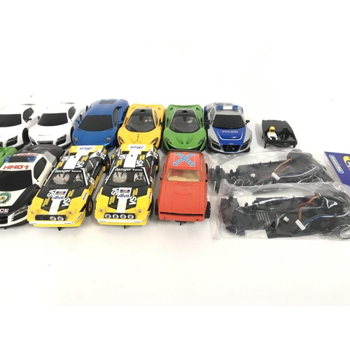 730 - A collection of 15 Scalextric cars. Plus some spare parts. No reserve.