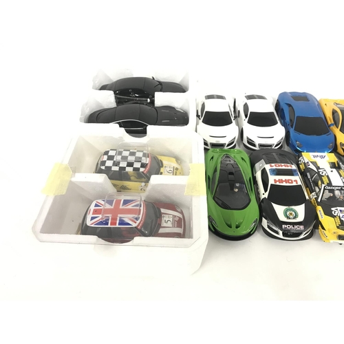 730 - A collection of 15 Scalextric cars. Plus some spare parts. No reserve.