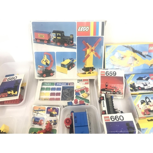 736 - A collection Of Various Boxed And Loose Lego Sets. All Boxes Have Been Opened. And a Collection of L... 