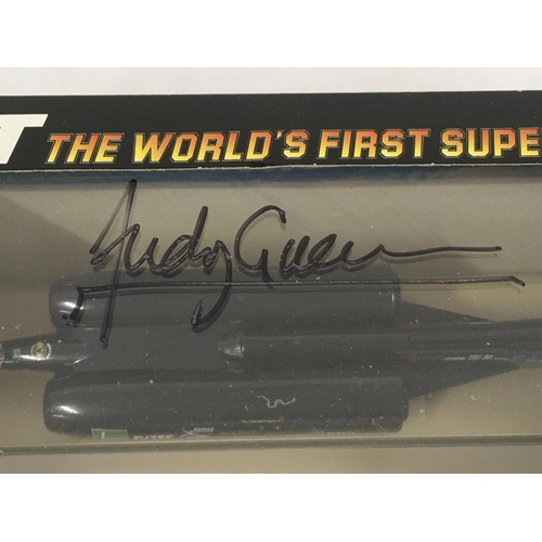 83 - A boxed model of Thrust the worlds first supersonic car. This model has been signed by Andy Green th... 