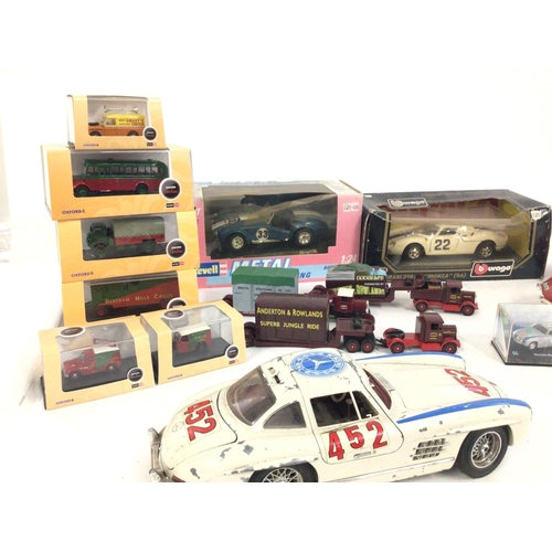 834 - A collection of 15 model vehicles by burago..Oxford..Lledo etc. some boxed and unused others loose a... 