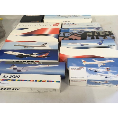 85 - A collection in excess of 15 boxed model aircraft which were sold by the respective airlines to pass... 