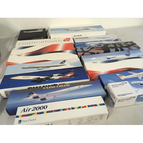 85 - A collection in excess of 15 boxed model aircraft which were sold by the respective airlines to pass... 