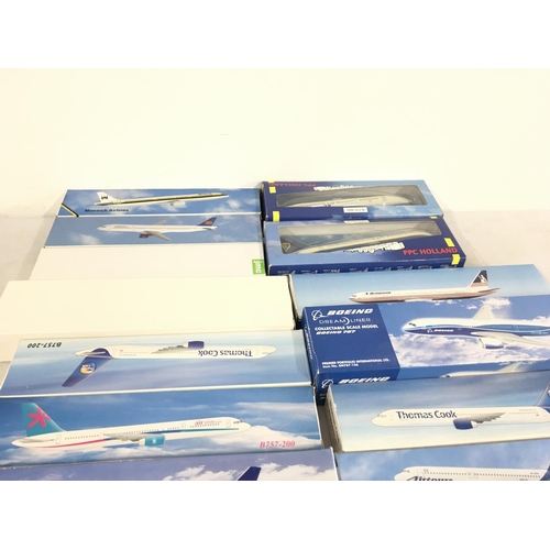 86 - A collection of model civil aircraft depicting airlines from across the world all in original boxes ... 