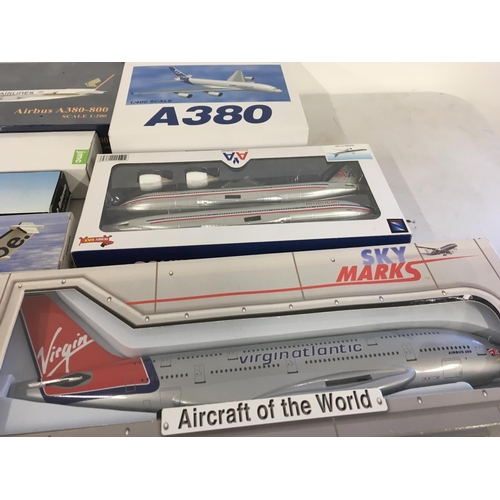 87 - A collection of model civil aircraft representing airlines from all over the world all are boxed and... 