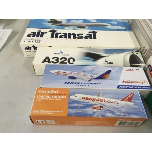 87 - A collection of model civil aircraft representing airlines from all over the world all are boxed and... 