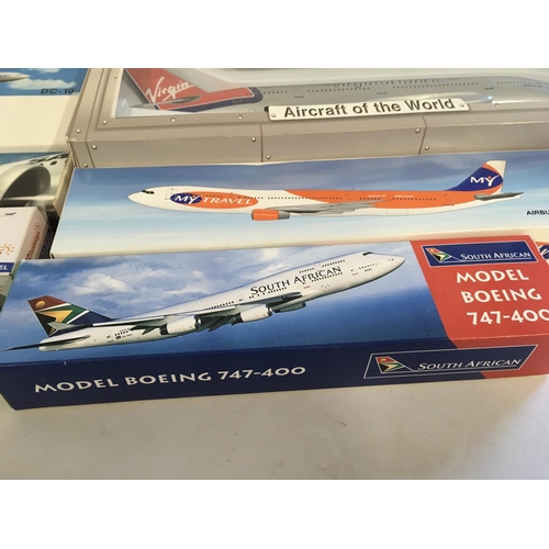 87 - A collection of model civil aircraft representing airlines from all over the world all are boxed and... 