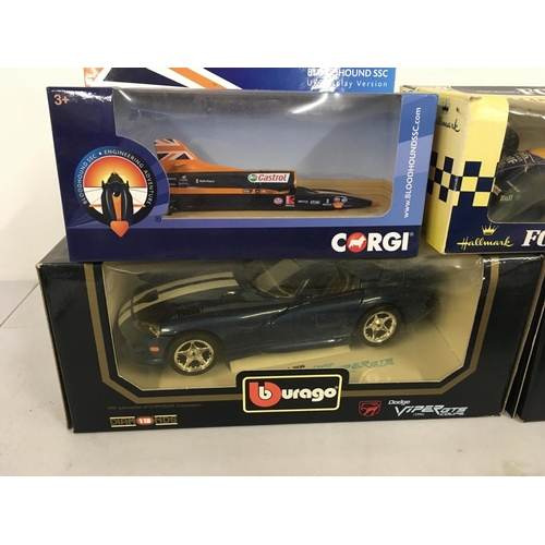 90 - A collection of model cars by burago..Corgi and Onyx all in original packaging. Also 3 model kits by... 