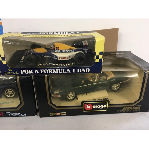 90 - A collection of model cars by burago..Corgi and Onyx all in original packaging. Also 3 model kits by... 