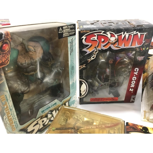 94 - A collection of 8 boxed SPAWN action figures.