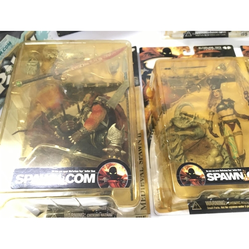 94 - A collection of 8 boxed SPAWN action figures.