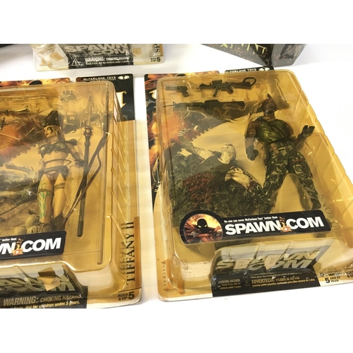 94 - A collection of 8 boxed SPAWN action figures.