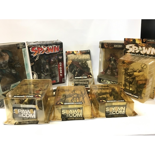 94 - A collection of 8 boxed SPAWN action figures.