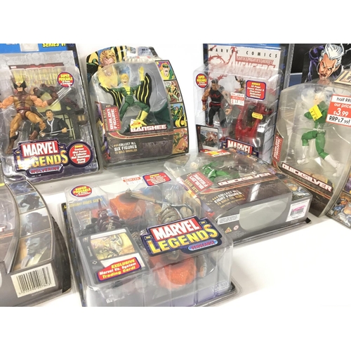 95 - A collection of 11 Marvel Legends action figures all unopened in the original display packaging.