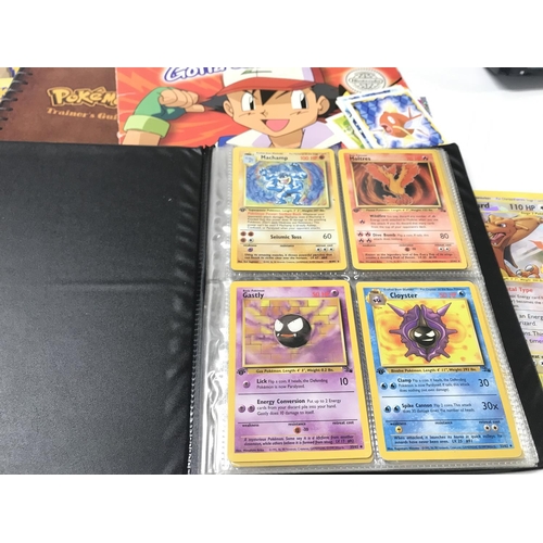 98 - 4 X Binders Containing Vintage Pokemon and Digimon Cards. A incomplete Merlin Sticker Book and Coin ... 