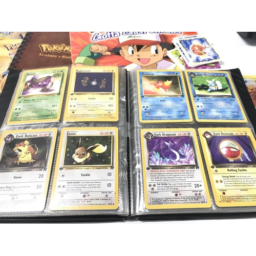 98 - 4 X Binders Containing Vintage Pokemon and Digimon Cards. A incomplete Merlin Sticker Book and Coin ... 