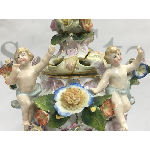1004 - A pair of Chelsea porcelain Potpourri vases , some damage . 21cm tall approximately. This lot cannot... 