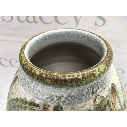 1006 - A Denby pottery studio vase, decorated in tones of green, browns, grey , 31.5cm tall approximately .... 