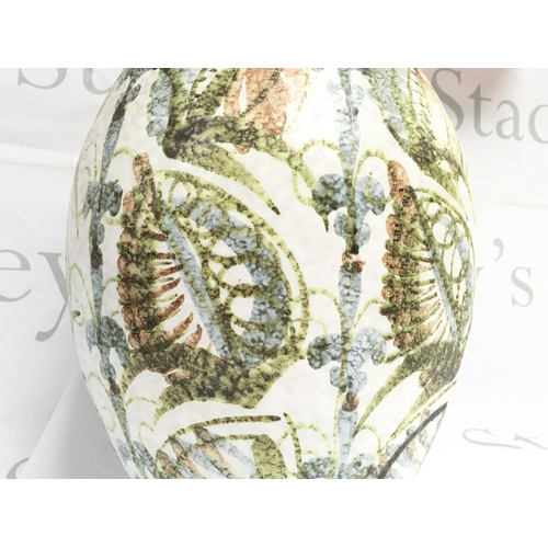 1006 - A Denby pottery studio vase, decorated in tones of green, browns, grey , 31.5cm tall approximately .... 