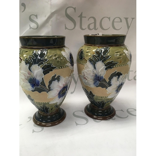 1009 - A pair of Doulton vases decorated with flowers and foliage. 20 cm no damage or restoration .