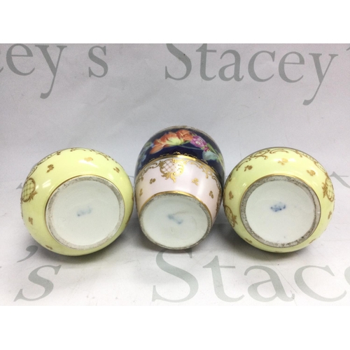 1019 - Three German porcelain vases with hand painted floral decoration, tallest approx 20cm. Shipping cate... 