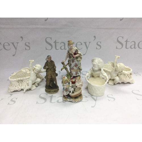 1022 - A pair of Copeland blanc de chine posies, a Victorian figural match holder and striker etc. Shipping... 