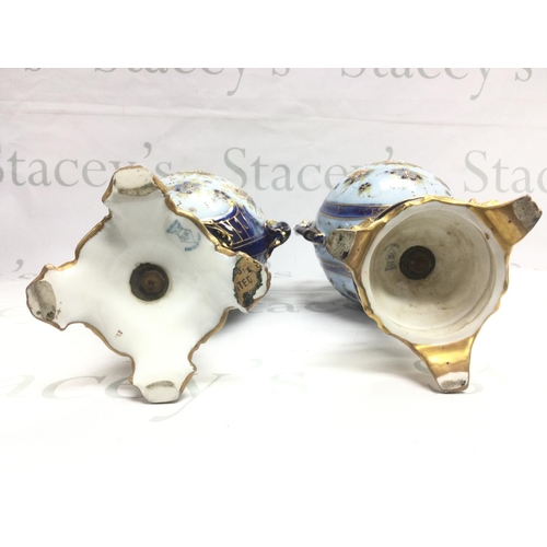 1025 - Two Rudolstadt vases decorated with blues and gilt with floral sprays, tallest approx 42cm. Shipping... 