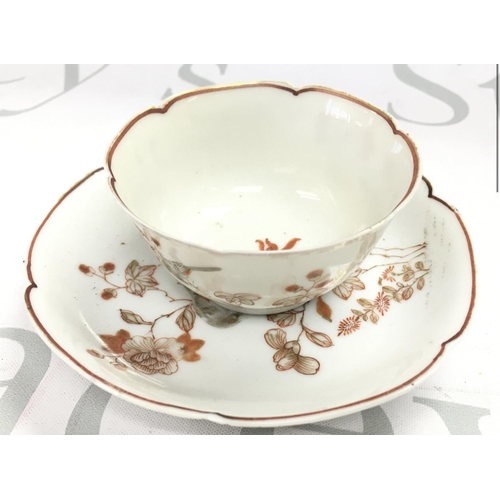 857 - A Chinese Yongzheng tea bowl and saucer with hand painted decoration of birds and peony. This lot ca... 