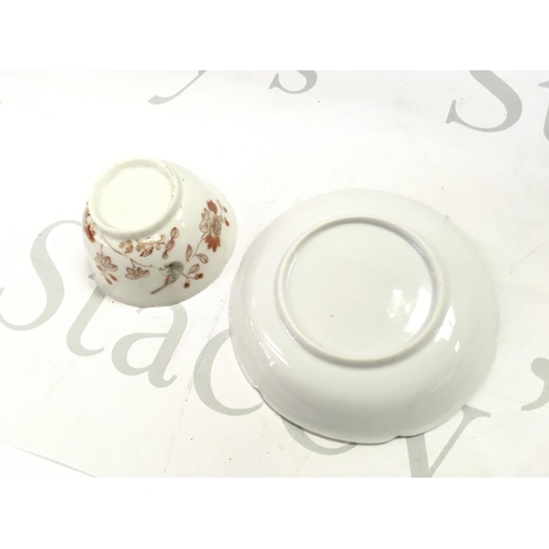 857 - A Chinese Yongzheng tea bowl and saucer with hand painted decoration of birds and peony. This lot ca... 