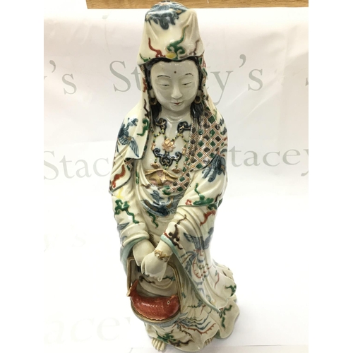 870 - A large Cantonese Guan Yin porcelain figure, damaged fish tail. 45cm tall. This lot cannot be posted