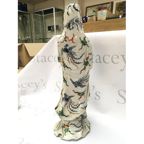 870 - A large Cantonese Guan Yin porcelain figure, damaged fish tail. 45cm tall. This lot cannot be posted
