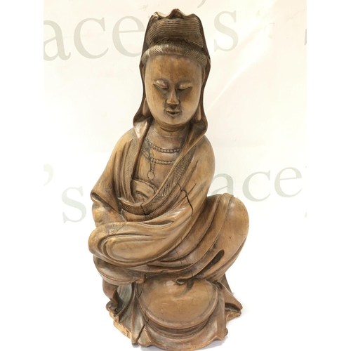 871 - A carved wooden Guanyin figure ,27cm tall. Postage category B