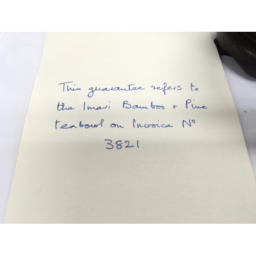 872 - An Imari bamboo and pine tea bowl raised from the wreck of the Geldermalsen with COA.