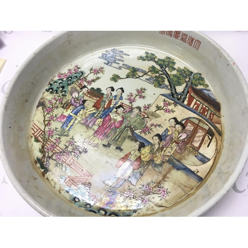 880 - A Chinese Famille Rose Courtyard scene large dish , 41cm wide. No obvious large damage or restoratio... 