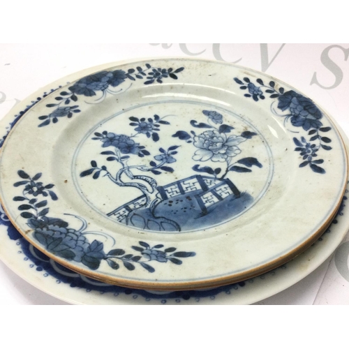 887 - Chinese blue and white plates and a Famille rose plate, this lot cannot be posted