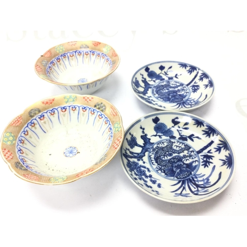 888 - Chinese small blue and white dragon dishes and some bowls. This lot cannot be posted