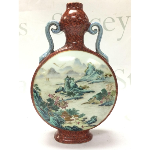 892 - A Chinese moon flask vase with painted panel landscape scene design , 21cm tall. This lot cannot be ... 