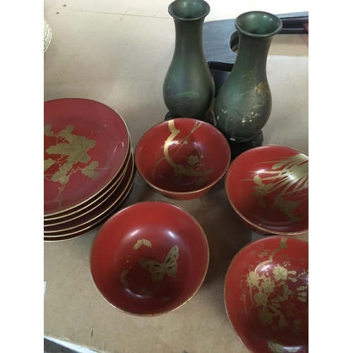 899 - A pair of lacquer vase and dishes .