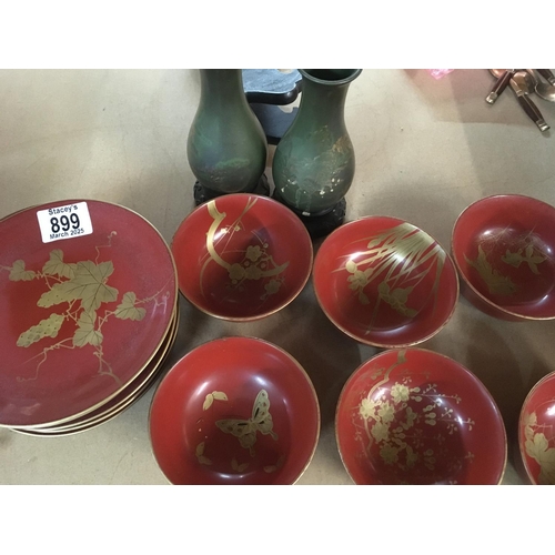 899 - A pair of lacquer vase and dishes .