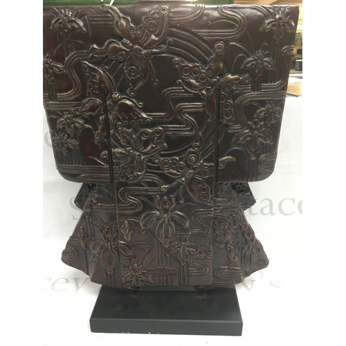 901 - A Japanese bronze sculptor in the form of a kimono mounted on a wooden base .53 cm .