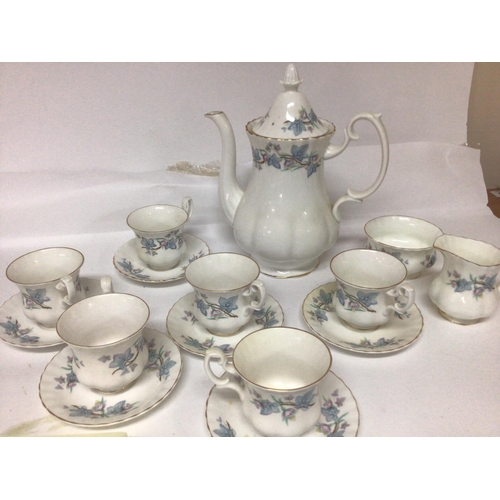 1036 - A Royal Kent bone china coffee set six place setting with coffee pot cream jug and sugar bowl with c... 