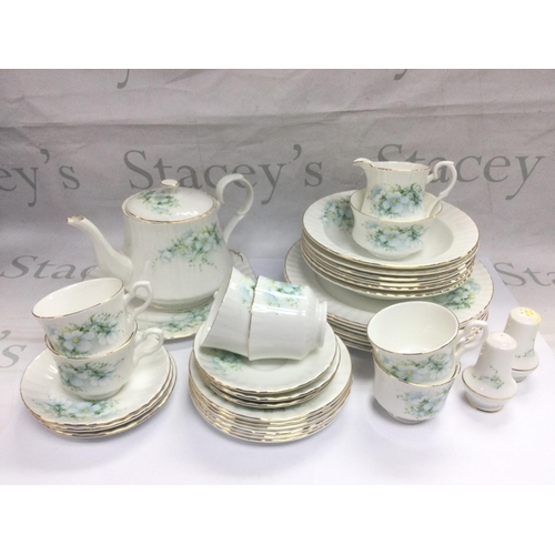 1043 - A Royal Stafford bone china tea and dinner set plus a Czechoslovakian tea set with floral spray deco... 