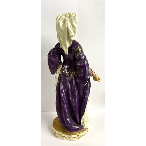 1048 - A rare large porcelain figure of an eastern lady with Derby porcelain marks, 34.5cm. (D) this figure... 