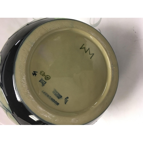 1053 - A Moorcroft Hyericum Rachel Bishop vase 25 cm .