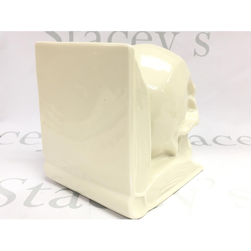 1055 - A rare Hungarian Herend ceramic skull bookend, no obvious damage or restoration . This lot cannot be... 